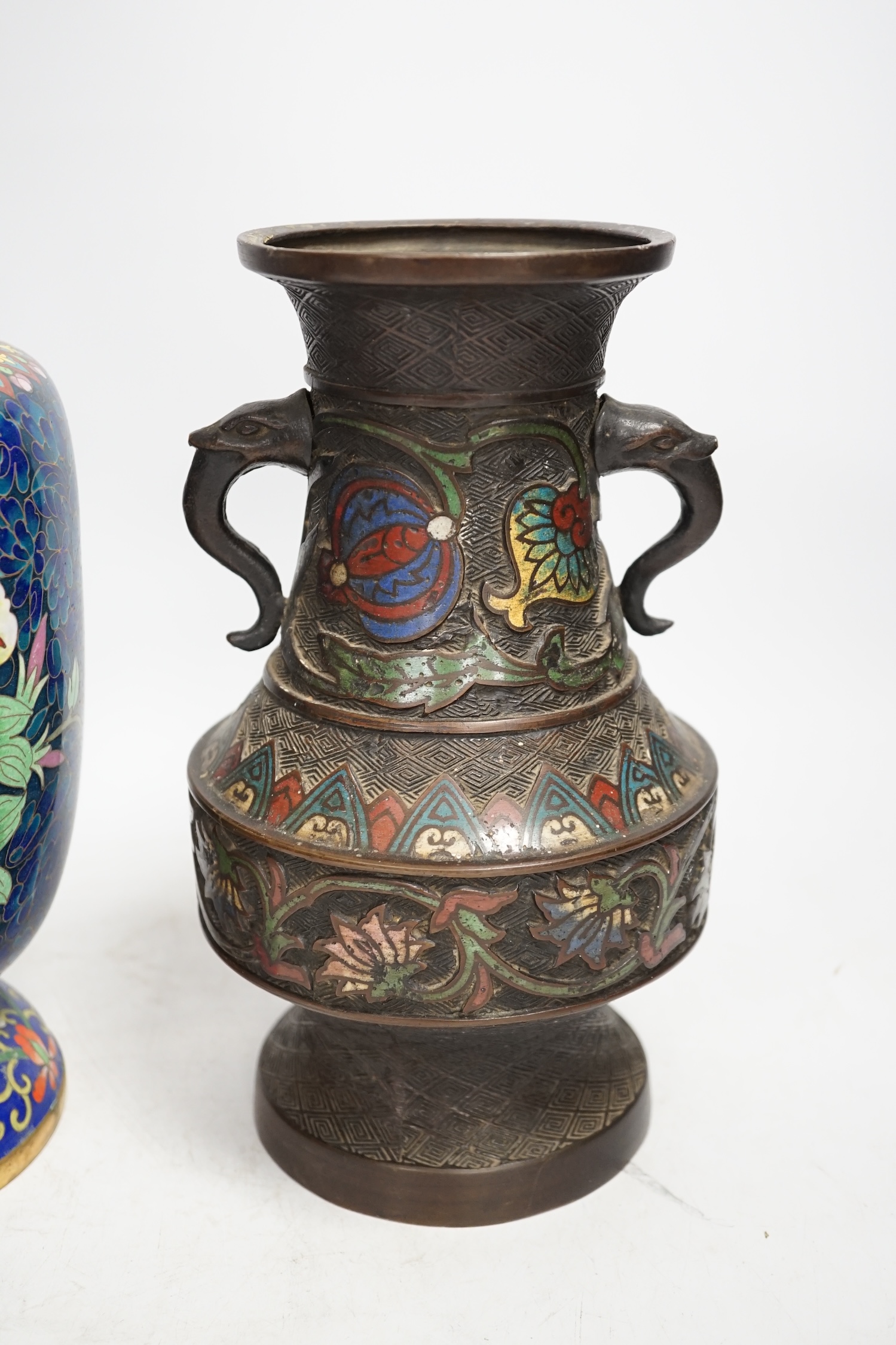 A Japanese bronze and champlevé enamel vase and a Chinese cloisonné enamel vase, Champlevé vase 24cm high. Condition - cloisonné vase dented, champlevé vase in good condition